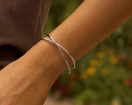 Sterling Silver Rhodium Plated Slip On Cross Over Bangle (11.10 mm)