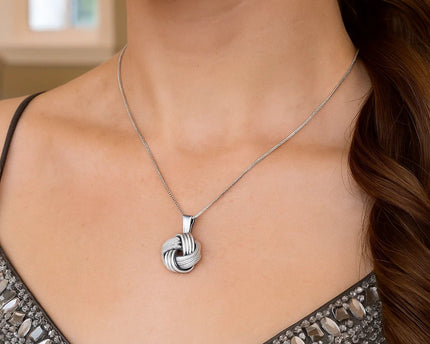 Sterling Silver Pendant with a Ridge Textured Love Knot Design